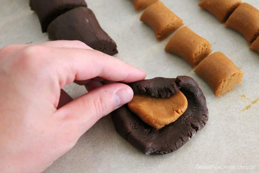 Peanut Butter Stuffed Chocolate Cookies - fold chocolate dough over peanut butter filling, then flatten