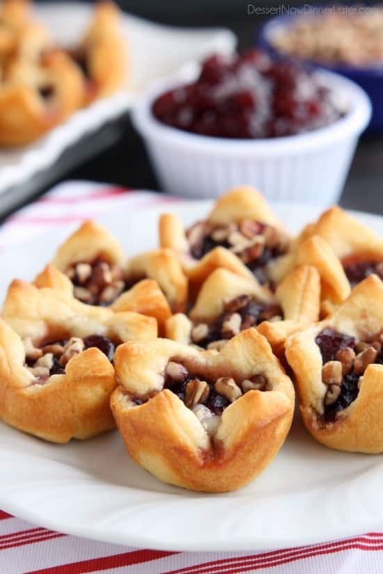 Cranberry Brie Bites are an easy 4-ingredient appetizer for your holiday party. Plus they taste amazing!