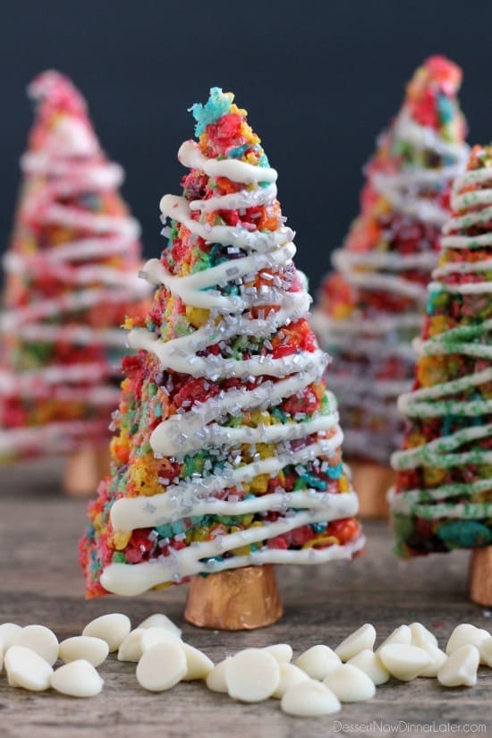 Fruity Pebbles cereal lights up these festive Krispie Treat Christmas Trees that are easy and fun to make for the holidays!