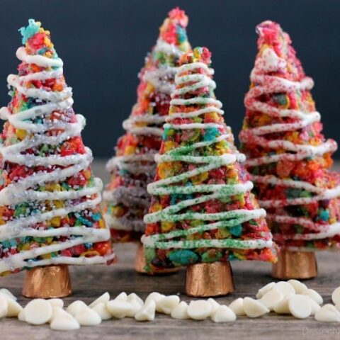 Fruity Pebbles cereal lights up these festive Krispie Treat Christmas Trees that are easy and fun to make for the holidays!