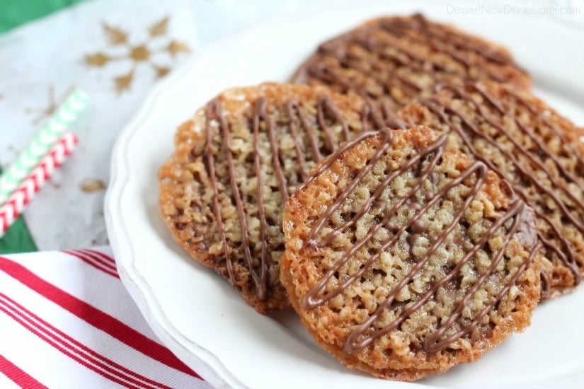 Thin, crisp, buttery cookies are sandwiched between melted milk chocolate with an extra chocolate drizzle on top. They taste like toffee and they look like lace. These Florentine Cookies are a holiday favorite!