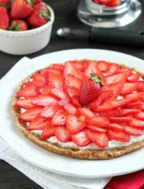 This Strawberry Greek Yogurt Tart is a delicious and healthy Valentine's Day dessert! It's even healthy enough to eat for breakfast too!