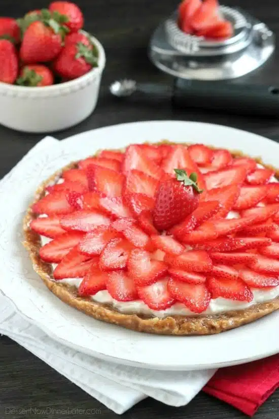 This Strawberry Greek Yogurt Tart is a delicious and healthy Valentine's Day dessert! It's even healthy enough to eat for breakfast too!