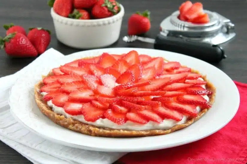 This Strawberry Greek Yogurt Tart is a delicious and healthy Valentine's Day dessert! It's even healthy enough to eat for breakfast too!