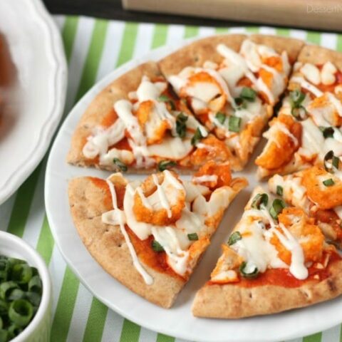 Farm Rich Boneless Buffalo Chicken Bites help make this flatbread pizza a quick and delicious game day snack!