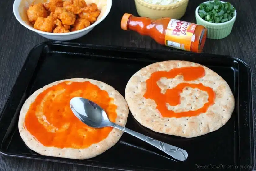 Farm Rich Boneless Buffalo Chicken Bites help make this flatbread pizza a quick and delicious game day snack!