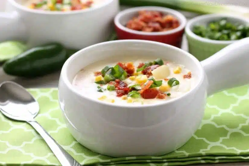 This Creamy Chicken and Corn Chowder is hearty and comforting with generous helpings of chicken, corn, bacon, green onions, potatoes and a slight kick of jalapeño. 