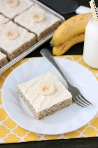 This is the BEST banana cake topped with the BEST cream cheese frosting! Perfect for picnics and potlucks, this banana sheet cake is a crowd pleaser! Everyone asks for the recipe!