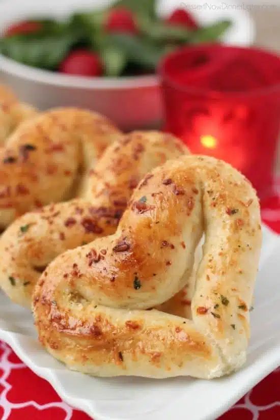 Close up shot of heart shaped breadstick.