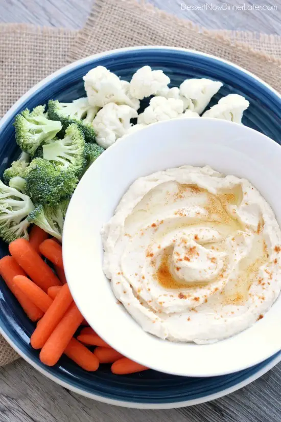 This low carb cauliflower hummus is smooth, creamy, and full of savory garlic flavor!