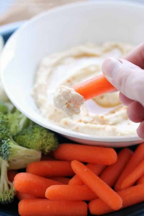 This low carb cauliflower hummus is smooth, creamy, and full of savory garlic flavor!