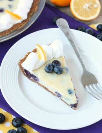 Just like key lime pie, this creamy lemon and blueberry pie has a buttery graham cracker crust and a zesty (Meyer lemon) citrus cream filling, with the added bonus of plump blueberries. Top it with fresh whipped cream and you've got a delicious fruity dessert!