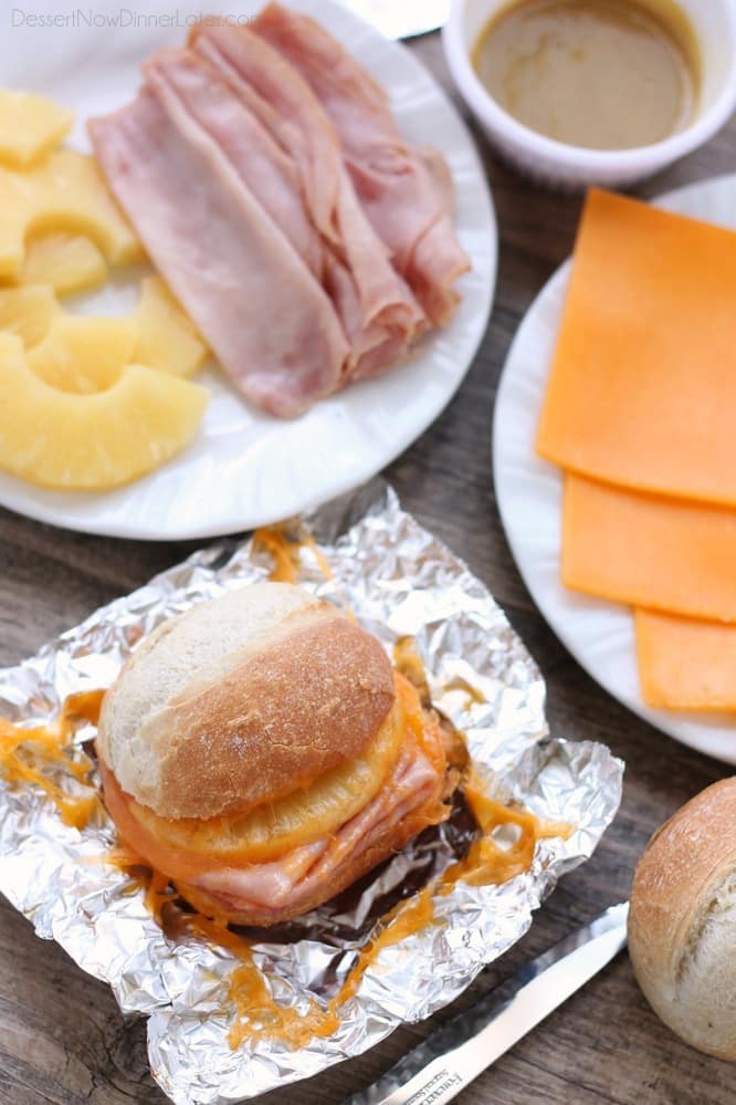 These Hot Ham and Pineapple Campfire Sandwiches are a delicious and easy tin foil recipe. Plus cleanup is a breeze! (You can even bake these in the oven too!)