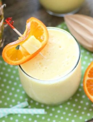 Just add ice to this frothy, sweet, and creamy 4-ingredient summer slush, also known as Pineapple Orange Smoothie.