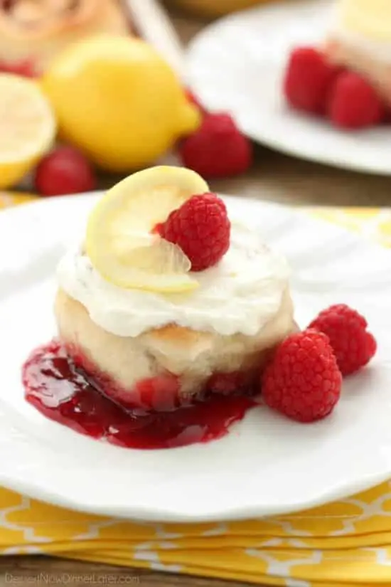 Sticky Raspberry Lemon Rolls are made easy with frozen dough and are topped with a sweet and citrusy lemon cream cheese frosting.