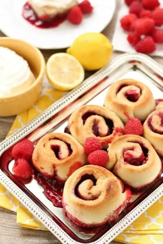 Sticky Raspberry Lemon Rolls are made easy with frozen dough and are topped with a sweet and citrusy lemon cream cheese frosting.