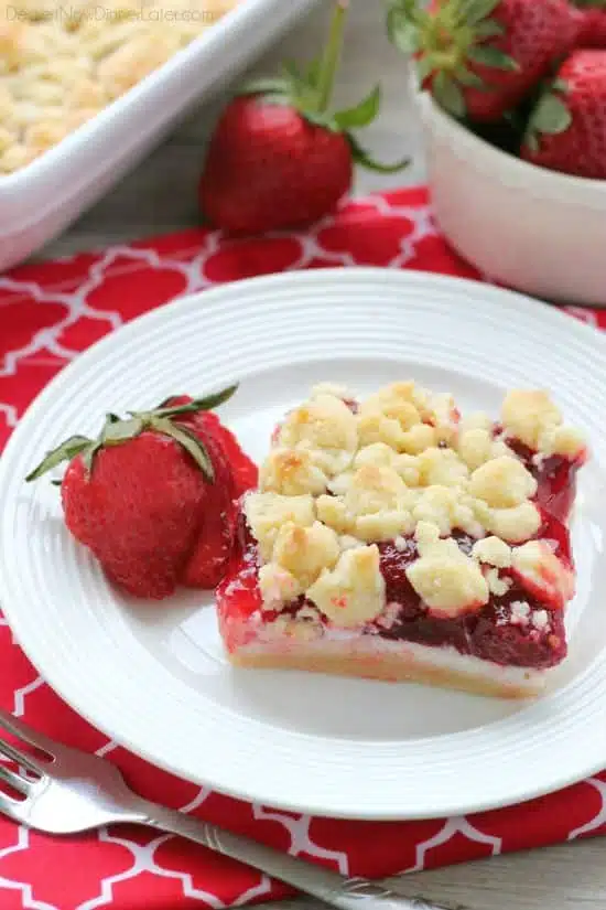 These strawberries and cream crumb bars are sweet and creamy with a buttery crumb crust and topping.