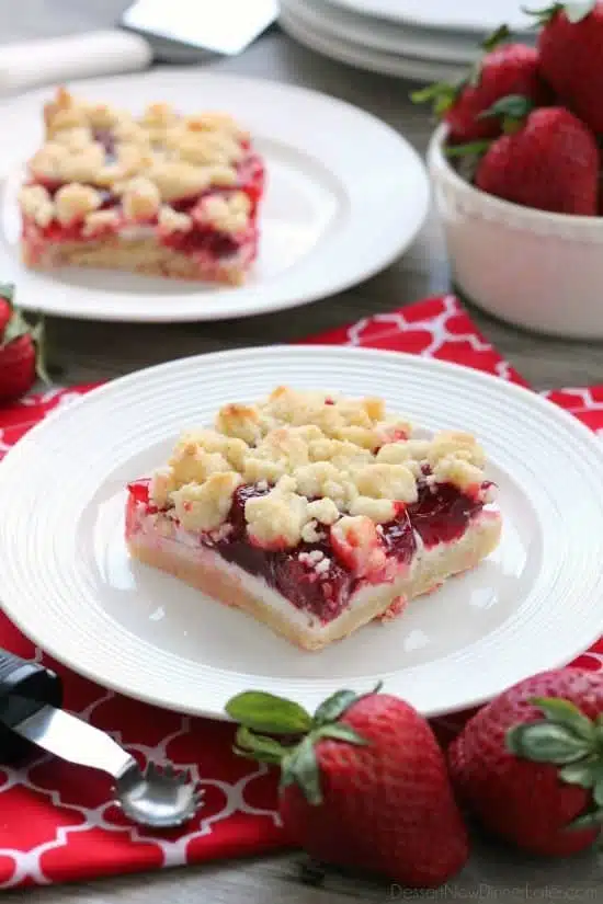 These strawberries and cream crumb bars are sweet and creamy with a buttery crumb crust and topping.