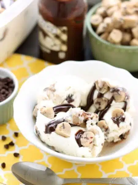 This no churn chocolate chip cookie dough ice cream has generous pieces of eggless cookie dough inside a creamy vanilla ice cream with hot fudge swirls. No ice cream machine needed to make this delicious dessert!