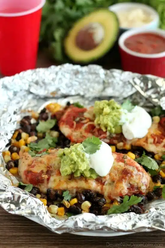 These Southwestern Chicken Packets are an easy and delicious tin-foil dinner recipe you can cook with a fire (while camping), on a grill, or in an oven.