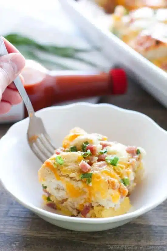 This hearty breakfast casserole is made with ham, eggs, cheese, and tender buttermilk biscuits. Make it ahead of time or bake it right away, for a breakfast ready when you are.