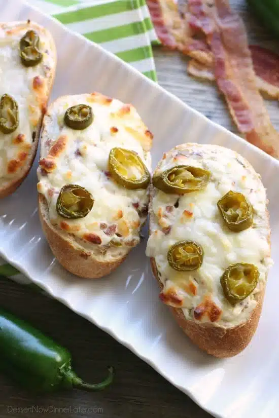 Jalapeno Popper Bread can double as a delicious appetizer or easy pizza dinner with bacon, cream cheese, and jalapeno slices for maximum flavor!