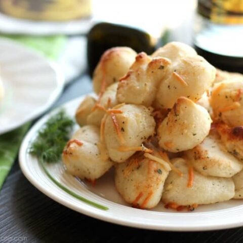 This easy Ranch Monkey Bread is a tasty appetizer that will get eaten just as fast as it is made! Tangy ranch, savory parmesan, and creamy butter season frozen dough into the perfect monkey bread bites.