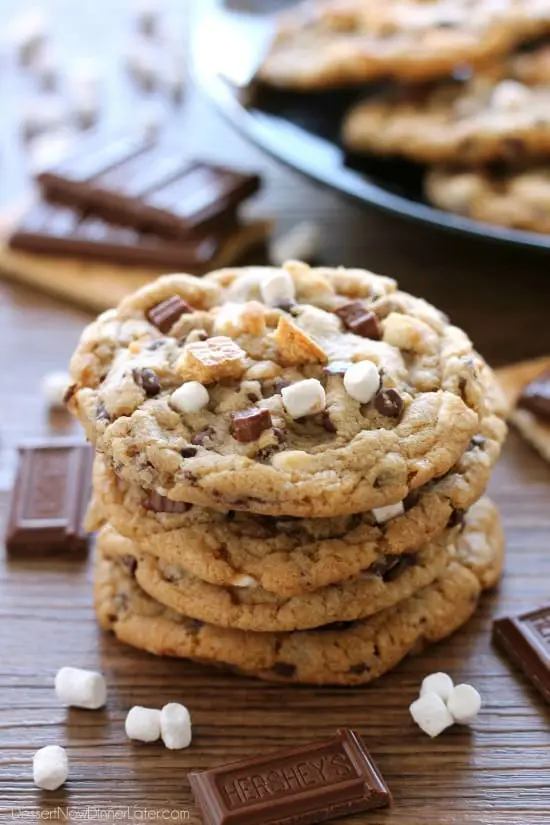 These S'mores Cookies are made with a graham cracker cookie dough, miniature chocolate chips, and marshmallows bits for a great alternative to campfire s'mores that is equally as tasty. 