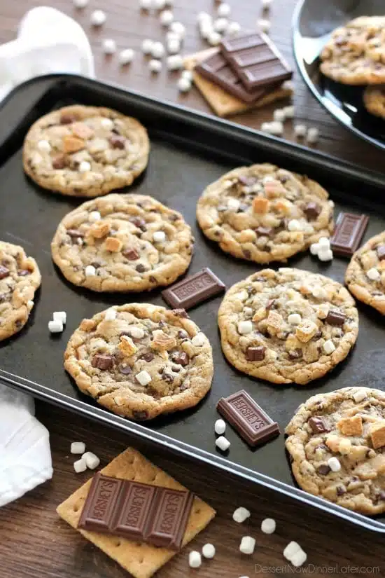 These S'mores Cookies are made with a graham cracker cookie dough, miniature chocolate chips, and marshmallows bits for a great alternative to campfire s'mores that is equally as tasty. 