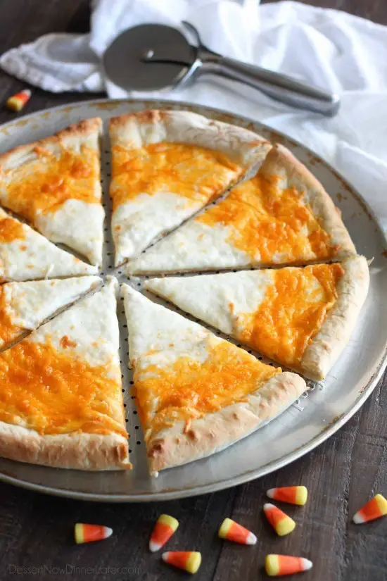 Candy Corn Pizza is a fun and easy idea for Halloween dinner -- even the kids can make it!