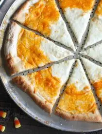 Candy Corn Pizza is a fun and easy idea for Halloween dinner -- even the kids can make it!