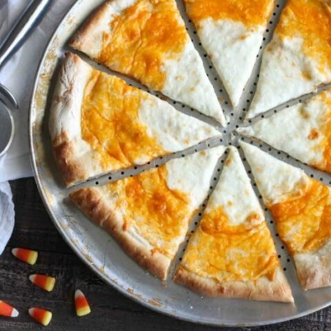 Candy Corn Pizza is a fun and easy idea for Halloween dinner -- even the kids can make it!