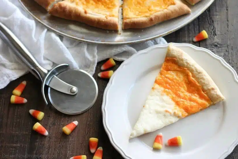 Candy Corn Pizza is a fun and easy idea for Halloween dinner -- even the kids can make it!