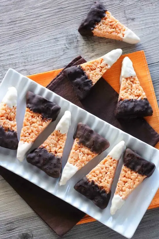 Chocolate Dipped Candy Corn Rice Krispie Treats are a fun and easy Halloween treat that the whole family will enjoy!