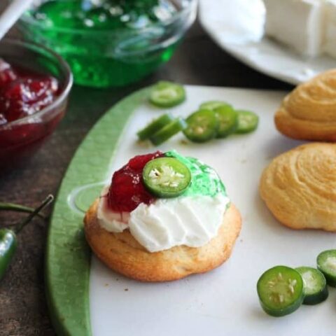 Sweet and heat combine in these cranberry jalapeño crescent bites with a cooling layer of cream cheese. Simple and unique, this holiday appetizer that will have your guests wanting more.