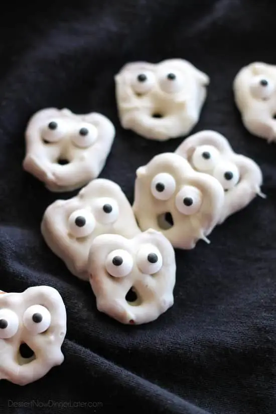 Ghost Pretzels - White chocolate dipped pretzels are made into ghosts with candy eyes and a little bit of imagination.
