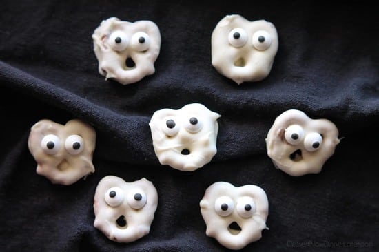 Ghost Pretzels - White chocolate dipped pretzels are made into ghosts with candy eyes and a little bit of imagination.