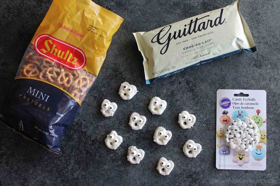 Ghost Pretzels - White chocolate dipped pretzels are made into ghosts with candy eyes and a little bit of imagination.