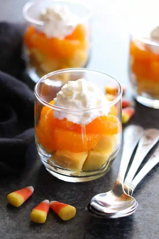 These layered fruit parfaits are a fun and festive, healthy candy corn treat for Halloween!