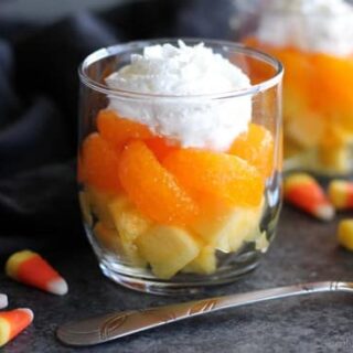 These layered fruit parfaits are a fun and festive, healthy candy corn treat for Halloween!