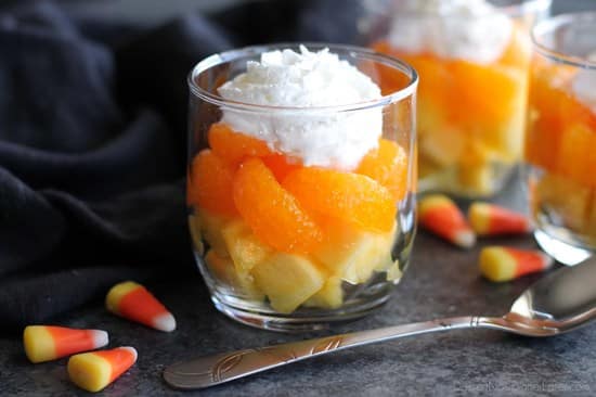 These layered fruit parfaits are a fun and festive, healthy candy corn treat for Halloween!