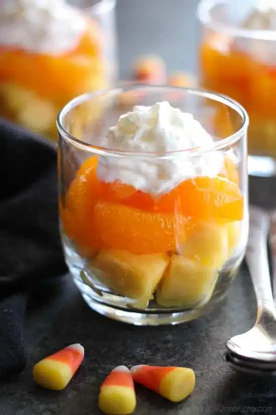 These layered fruit parfaits are a fun and festive, healthy candy corn treat for Halloween!