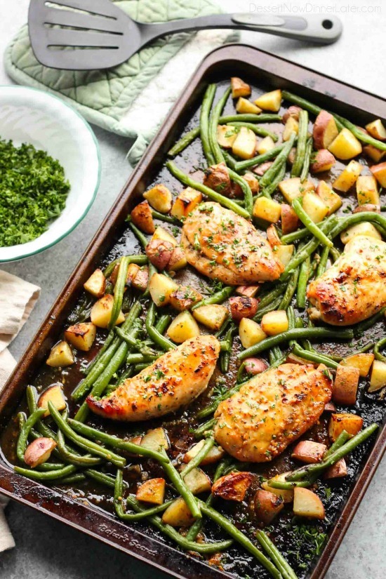 This one pan chicken dinner has the most delicious honey garlic glazed chicken alongside tenderly roasted potatoes and green beans. Plus, it's so easy and flavorful, you'll make again and again!