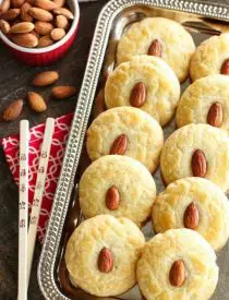 Chinese Almond Cookies are simple, crisp, buttery, and full of almond flavor. Save this recipe for Chinese New Year!