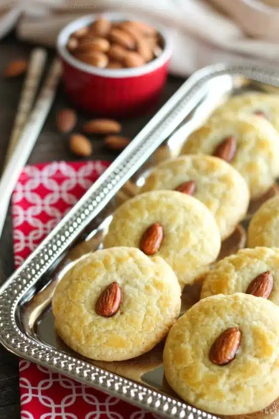 Chinese Almond Cookies are simple, crisp, buttery, and full of almond flavor. Save this recipe for Chinese New Year!