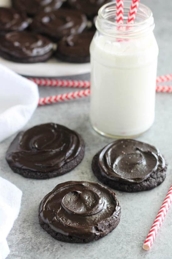 Fudgy dark chocolate sugar cookies are frosted with a creamy chocolate buttercream frosting. Inspired by Swig's Dirtball Cookie, these frosted chocolate sugar cookies are sure to be a new favorite!