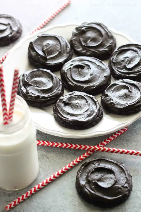 Fudgy dark chocolate sugar cookies are frosted with a creamy chocolate buttercream frosting. Inspired by Swig's Dirtball Cookie, these frosted chocolate sugar cookies are sure to be a new favorite!