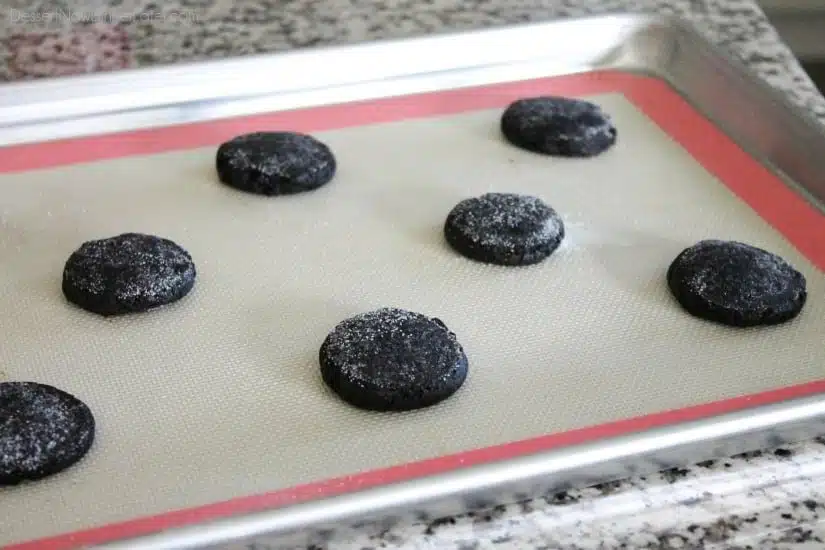 Fudgy dark chocolate sugar cookies are frosted with a creamy chocolate buttercream frosting. Inspired by Swig's Dirtball Cookie, these frosted chocolate sugar cookies are sure to be a new favorite!