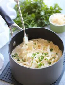 This Garlic Parmesan Spaghetti has browned butter and garlic in its thick and creamy parmesan sauce, for a super flavorful pasta dinner that will have you licking the plate clean.