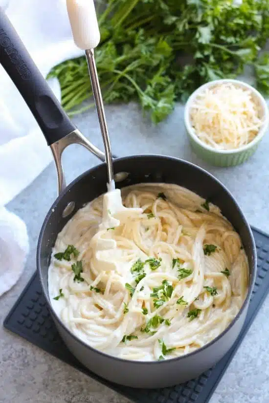 This Garlic Parmesan Spaghetti has browned butter and garlic in its thick and creamy parmesan sauce, for a super flavorful pasta dinner that will have you licking the plate clean.